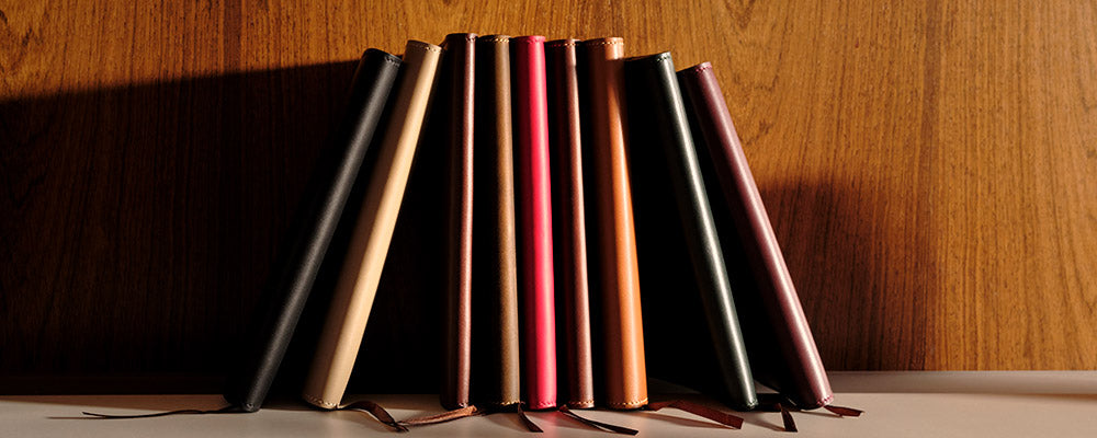 A beautiful stack of Tusting Leather Notebooks