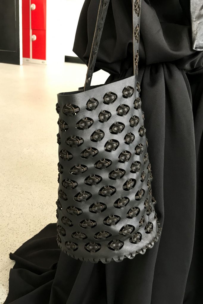 Laser-cut leather handbag design by Rebekah Mrazik
